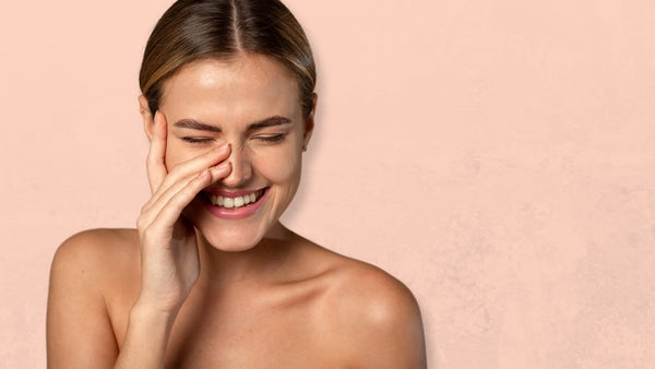 Applying moisturizer smiling